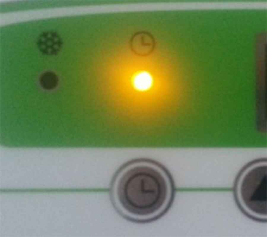 Timer active light - this appears much brighter in the photograph than it really is.